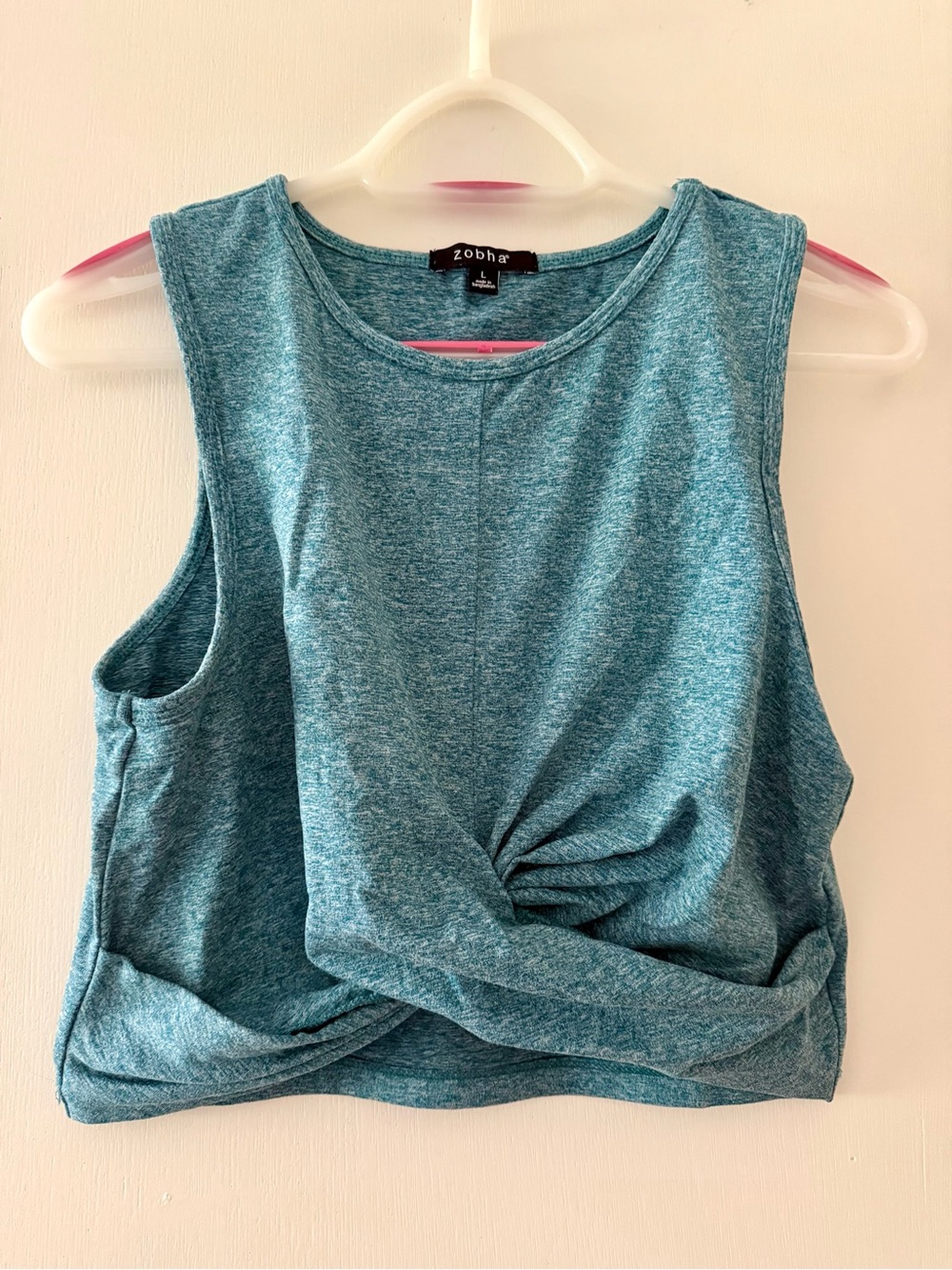 Cropped workout tank with front twist detail